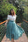 White top and emerald skirt